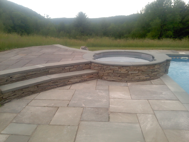 Natural Cleft Full Color Multiple Pattern Decking, Thermal Poll & Spa Coping & 4" Ashlar Veneer Wall